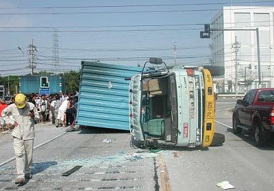 truck-tips-over-onto-car-man-still-alive-att4405510.jpg