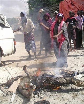 villagers-setting-some-guy-fire-bbq114yr2.jpg