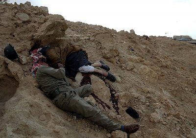 dead-bodies-found-after-fight-orig_iraqis2.jpg