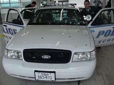 bullets-high-powered-rifles-flying-through-window-police-cruiser-plano-cop-car-3.jpg