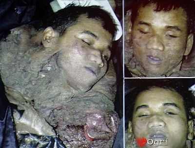 ogrish-dot-com-bali_suicide_bomber_remains1.jpg