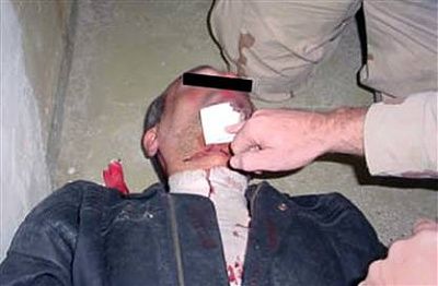 060215_abughraib_bcol_12p.hmedium.jpg