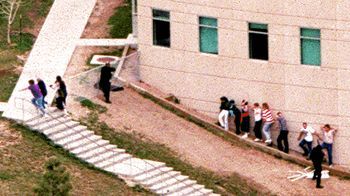 kidscoweringbehindwall.jpg
