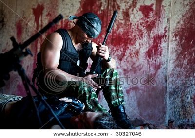 stock-photo-mercenary-gun-near-dead-body-bloody-wall-background-30327046.jpg