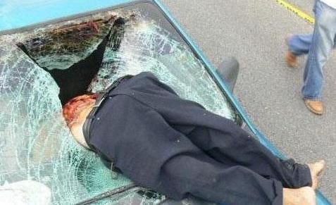 guy dead car accident windscreen 3.jpg