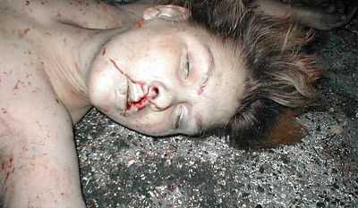 18362-girl-ripped-half-lays-topless-streetbig1.jpg