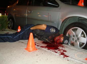29_05_03_300_EJECUTAN_A_POLICIA_COMERCIAL_SAN_CAYETANO-344x254.jpg