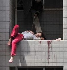 21626-bizarre-jump-girl-hits-13th-floor-instead-groundbig0.jpg