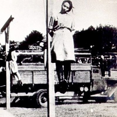 female_ss_hanged_at_stutthof_after_the_war.jpg