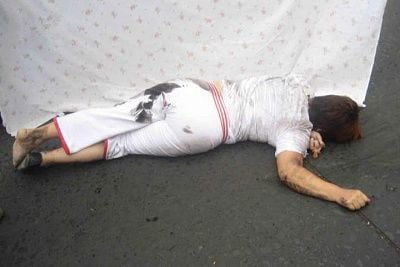 50-20yo-20-28approx-29-20woman-20run-20over-20and-20dragged-20by-20truck.jpg