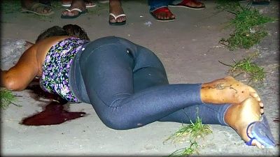 woman-20shot-20at-20a-20busstop-2004.jpg