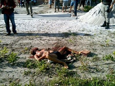 woman_stabbed_stripped_stoned.jpg