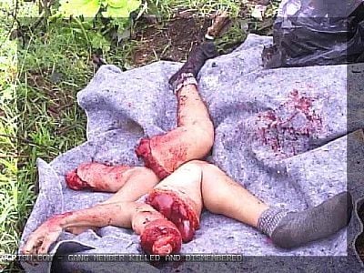 ogrish_dot_com_gang_member_killed_and_dismembered1.jpg