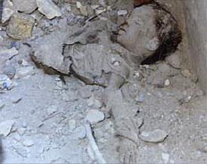 dead_baby_in_rubble.jpg