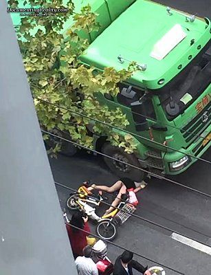young-woman-scooter-nailed-under-large-truck-1b-shanghai-ch-oct-9-16.jpg