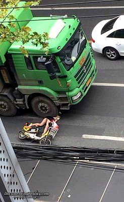 young-woman-scooter-nailed-under-large-truck-2b-shanghai-ch-oct-9-16.jpg
