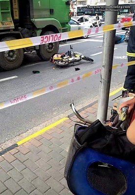 young-woman-scooter-nailed-under-large-truck-3b-shanghai-ch-oct-9-16.jpg