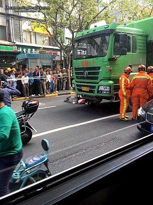 young-woman-scooter-nailed-under-large-truck-5b-shanghai-ch-oct-9-16.jpg