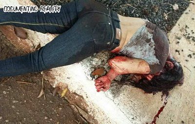 documentingreality.com-20-20woman-20stonned-20to-20death-2004.jpg