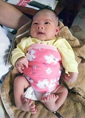 rt_chinese_baby_eight_toes_081114_ssv.jpg