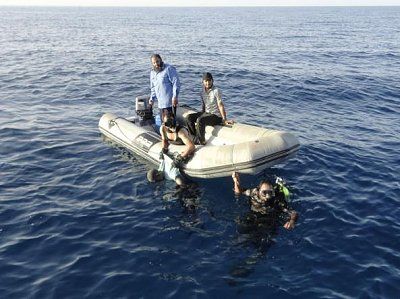 2014-08-24t055727z_495777842_gm1ea8o0xfn01_rtrmadp_3_libya-boat-027-kmhc-u43030401277113mab-593x.jpg