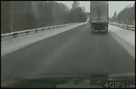 Close-call-truck-snowy-road.gif