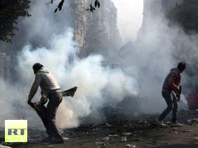 cairo-protester-tear-canister-230586.jpg