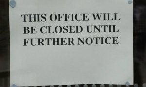 the-sign-on-the-jobcentre-door-627449349.jpg