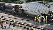 bal-ellicott-city-train-derails-pictures-20120821.jpg