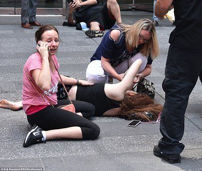 4080c97c00000578-4519432-distraught_pedestrians_were_spotted_helping_their_injured_friend-34_1.jpg