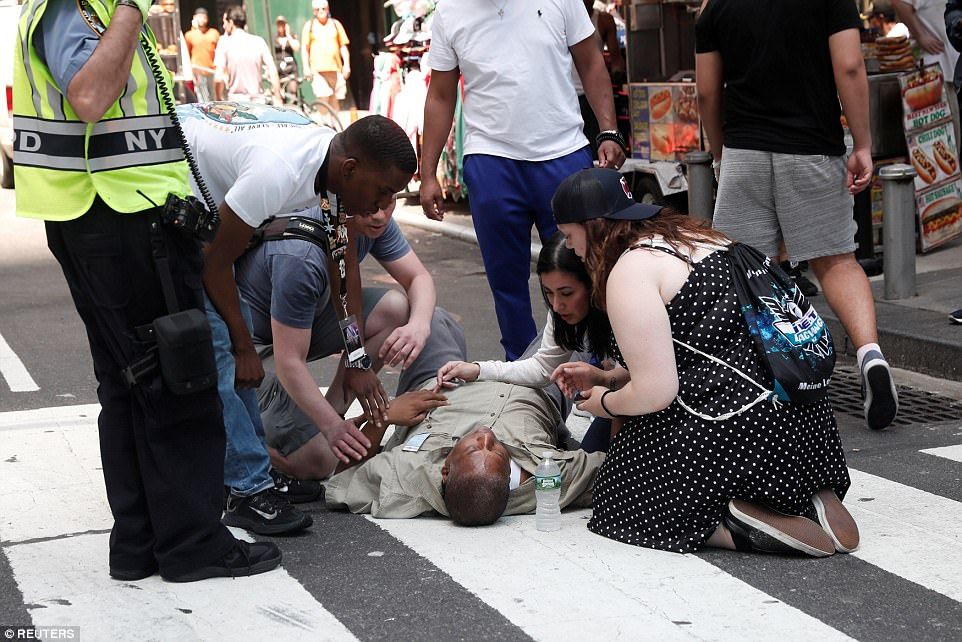 4080724200000578-4519432-An_injured_man_was_being_treated_on_the_ground_after_the_collisi-a-31_1.jpg