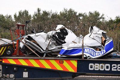 43934c1800000578-4825350-eight_people_have_died_after_a_minibus_was_squashed_flat_after_a-36_1.jpg