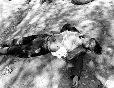 dead-20german-20female-20guard-20from-20the-20ohrdruf-20concentration-20camp.-20she-20was-20eith.jpg