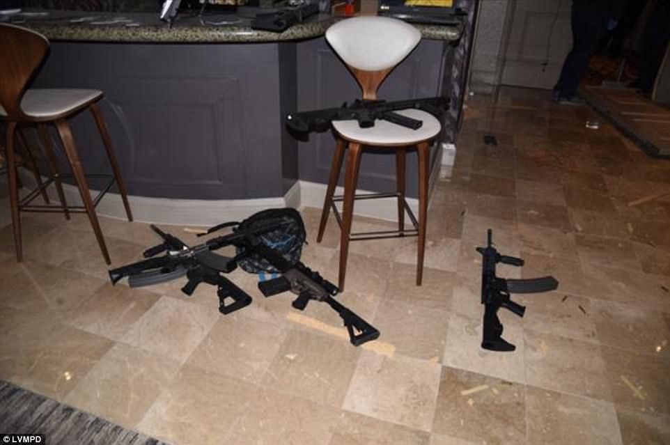 4853344C00000578-5289987-Twelve_of_the_rifles_had_been_fitted_with_bump_stock_devices_to_-a-159_.jpg