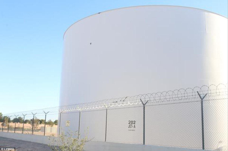 4853374D00000578-5289987-Several_bullets_hit_aviation_fuel_storage_tanks_at_nearby_McCarr-a-154_.jpg