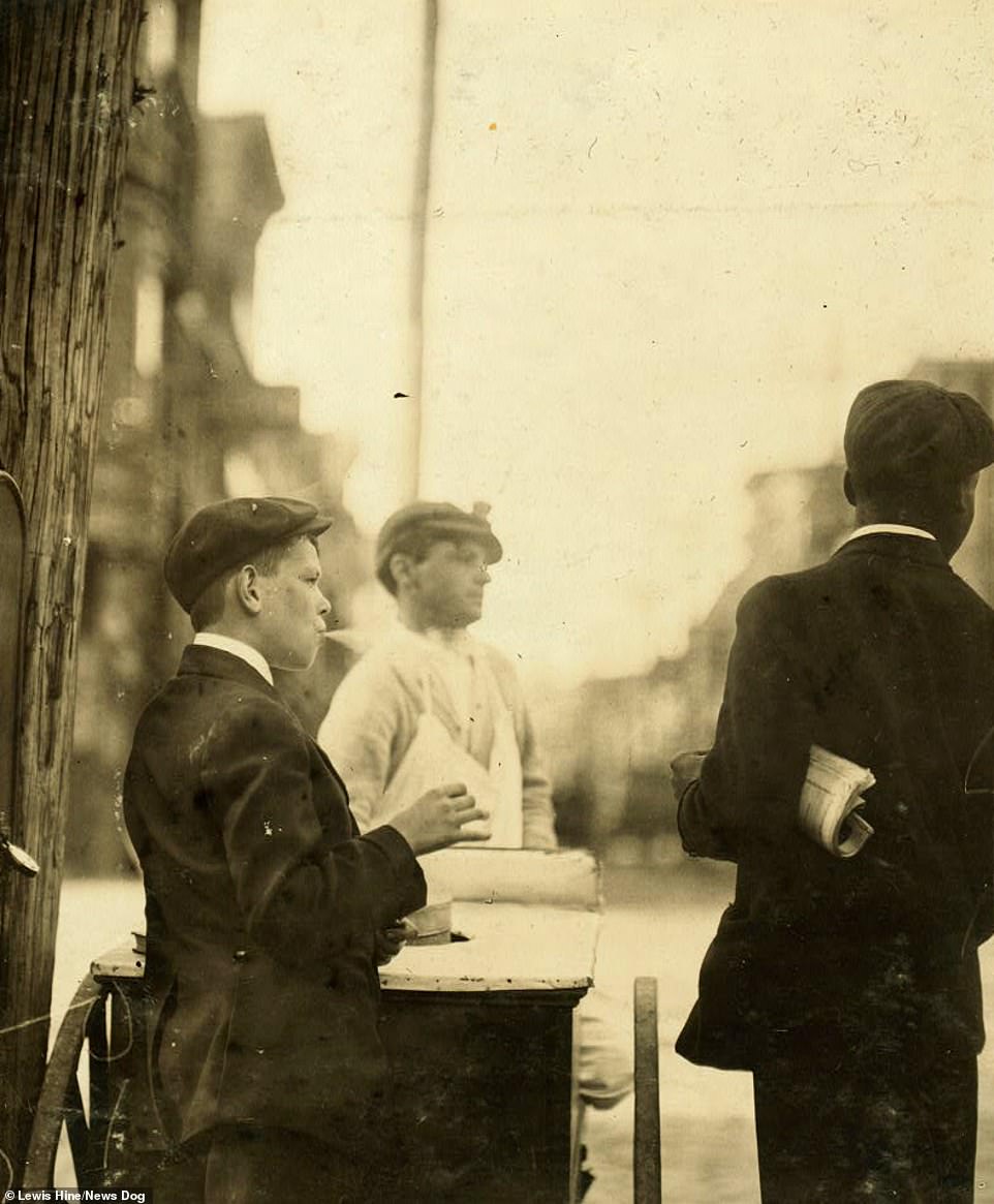 17263428-7355737-Pictured_is_another_news_boy_stood_next_to_a_cart_in_Wilmington_-a-38_156578997.jpg