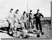 soldat-devant-cadavres-ALN-ain-beida-4-1959.jpg
