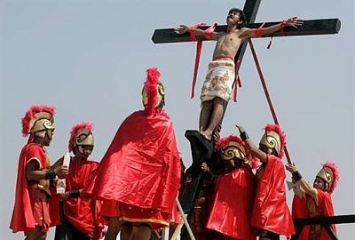christians-nailed-cross-2-17266340-1.jpg