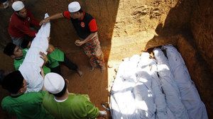 800_malaysia_mudslide_victims_ap_110522.jpg
