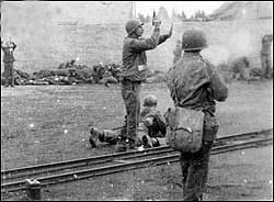 Lt. Felix Sparks stops the killing of SS soldiers at the wall.jpg