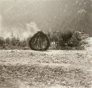 A memorial wreath on the site of a mass grave in the Ebensee concentration camp..jpg