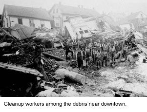 Cleanup-workers-in-debris.jpg