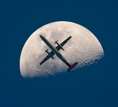 airplane-passing-mooon-perfect-timing.jpg