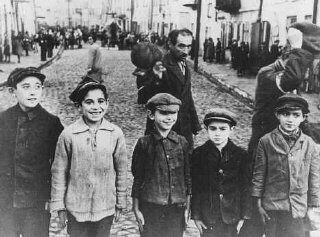 Name:  Jewish children in the Lublin ghetto. The men behind them were forced to remove their caps in de.jpg
Views: 5773
Size:  25.0 KB
