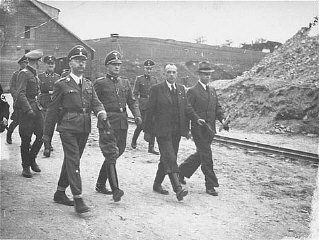 SS chief Heinrich Himmler (front row, left) and Mauthausen commandant Franz Ziereis (second from.jpg