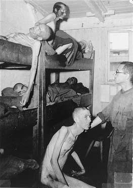 Tattooed survivors in a barracks in Mauthausen.jpg
