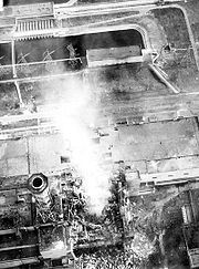 180px-Chernobyl_burning-aerial_view_of_core.jpg