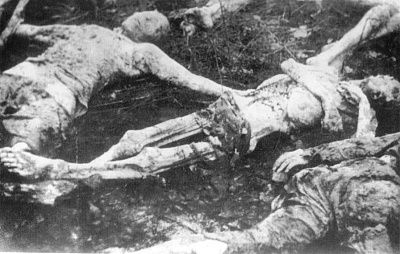 bodies-dug-out-pits.jpg