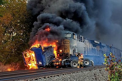 train-strikes-stalled-tractor.jpg