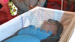 Liz_lisuntha_banda_in_casket_apr14.jpg